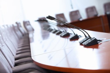 boardroom table with goosenecks